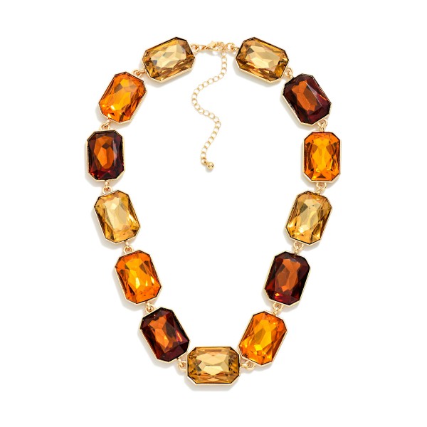 Emerald Cut Crystal Statement Necklace made of oversized faceted stones linked stone to stone in polished prong settings. The bold collar silhouette sits right at the neckline and finishes with a lobster clasp and extender. A showstopper for holiday parties, galas, weddings and New Year's Eve. Big glam at an approachable price, perfect for front table displays that stop shoppers in their tracks.