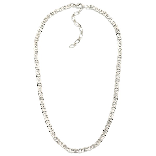 Flat Link Chain Necklace featuring a sleek, shimmering chain with flat, interlocking links that reflect the light. The polished finish feels elevated while staying easy to wear every day. Lobster clasp closure with an extender chain. A versatile layering chain that pairs with pendants or stands alone for a clean, modern look.