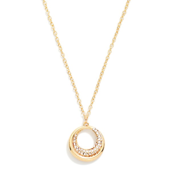 Pave Circle Pendant Necklace featuring an open ring pendant with a crescent of sparkling rhinestones. The glint of crystal adds just enough shine for everyday wear, special occasions, and holiday parties. Suspended on a fine chain with a lobster clasp and extender. A timeless circle design that makes an easy gift for birthdays, anniversaries, and bridesmaids.