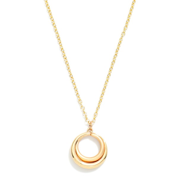 Organic Circle Pendant Necklace with a sculptural open ring pendant that has a soft, molten shape. Hung on a fine chain with a lobster clasp and extender, it adds subtle polish to everyday outfits. The minimalist design layers well with chokers and longer chains. A simple, modern piece at an easy price point that works as a self purchase or a thoughtful gift for any occasion.