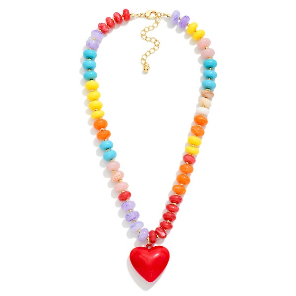 Rainbow Beaded Heart Pendant Necklace with smooth rondelle beads in a cheerful mix and a glossy puffed heart pendant at the center. An adjustable chain closure lets it sit right at the neckline. Sweet, playful, and easy to layer with dainty chains, it brings instant joy to tees, sundresses, and cozy knits. A feel good gift for birthdays, teachers, and best friends, heart jewelry like this sells year round and spikes again ahead of Valentine's Day.