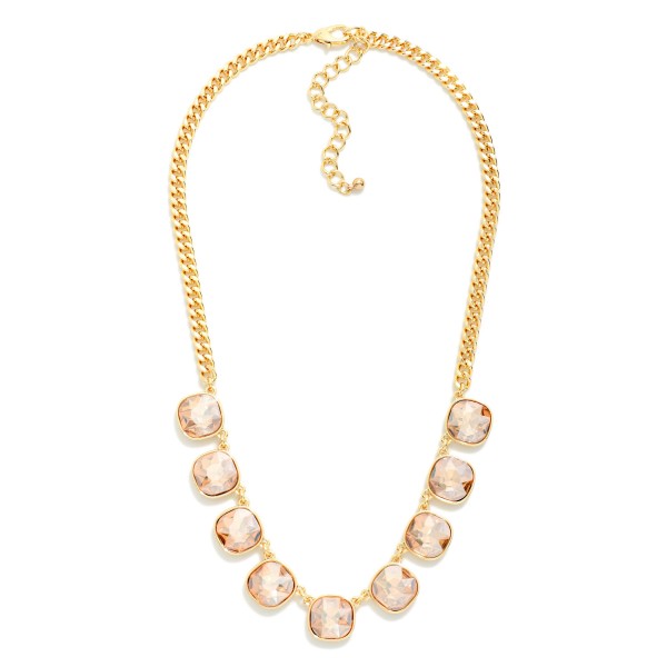 Cushion Cut Crystal Station Necklace featuring a row of faceted glass stones set in polished bezels along a classic curb chain. The stones catch light from every angle, adding just the right amount of sparkle to everyday outfits, holiday parties, and date nights. An adjustable extender lets it sit at the collarbone or slightly lower for layering. Sparkling stone necklaces are a perennial bestseller, and this one offers a polished, giftable look at an easy price point.