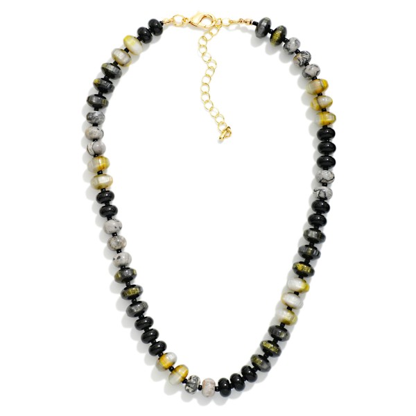 Faceted Crystal Rondelle Necklace strung with glass beads in a mixed, iridescent finish that shifts and shimmers with movement. Small metal spacers add polish, while the lobster clasp and extender chain make sizing easy. A refined everyday statement that dresses up sweaters, tees, and party dresses alike. Sparkly, wearable crystal strands are a holiday gifting favorite and sell steadily from fall through New Year's.