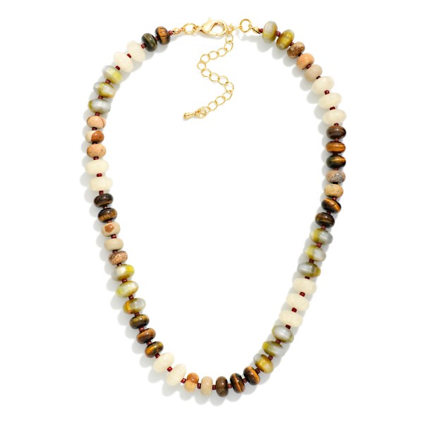 Faceted Crystal Rondelle Necklace strung with glass beads in a mixed, iridescent finish that shifts and shimmers with movement. Small metal spacers add polish, while the lobster clasp and extender chain make sizing easy. A refined everyday statement that dresses up sweaters, tees, and party dresses alike. Sparkly, wearable crystal strands are a holiday gifting favorite and sell steadily from fall through New Year's.