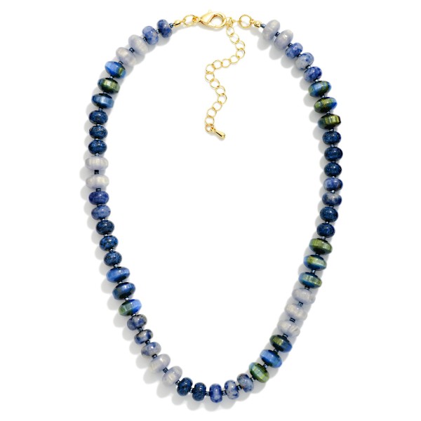 Faceted Crystal Rondelle Necklace strung with glass beads in a mixed, iridescent finish that shifts and shimmers with movement. Small metal spacers add polish, while the lobster clasp and extender chain make sizing easy. A refined everyday statement that dresses up sweaters, tees, and party dresses alike. Sparkly, wearable crystal strands are a holiday gifting favorite and sell steadily from fall through New Year's.