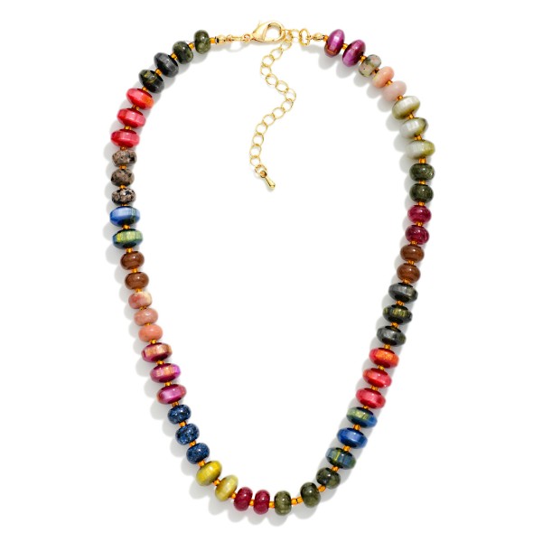 Faceted Crystal Rondelle Necklace strung with glass beads in a mixed, iridescent finish that shifts and shimmers with movement. Small metal spacers add polish, while the lobster clasp and extender chain make sizing easy. A refined everyday statement that dresses up sweaters, tees, and party dresses alike. Sparkly, wearable crystal strands are a holiday gifting favorite and sell steadily from fall through New Year's.