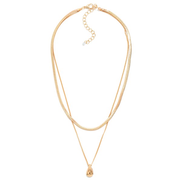 Dainty Layered Necklace featuring a smooth snake chain paired with a fine cable chain and a tiny polished nugget drop. The delicate, pre layered design adds just enough shine for everyday wear without overwhelming an outfit. Perfect for work, date nights, and layering under bolder statement pieces. Simple, minimal styles like this appeal to every age group and are a steady repeat seller.