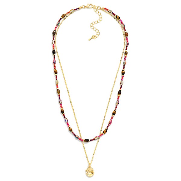 Layered Bead and Chain Necklace combining a strand of petite stone look beads with a fine chain and a tiny disc charm. Both layers share one clasp, so customers get a perfectly styled stack without any tangling. Easy to wear with everything from tees to sweaters for a polished, collected look. Pre layered necklaces are a consistent boutique best seller and an easy add on at checkout.