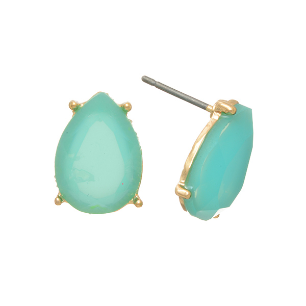 Gold tone post earrings featuring a turquoise teardrop shaped cabochon. Approximately 1/2" in length.