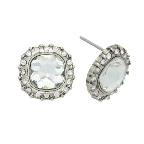 Burnished silver tone antique style rhinestone earrings with a halo. Approximately 1/2" in length.
