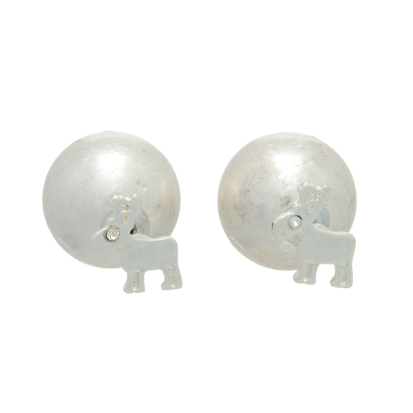 Worn silver tone double sided earrings with a reindeer front and a metal ball back. Approximately 1/2" in length.