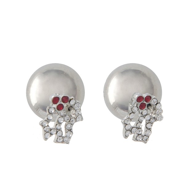 Silver tone double sided earrings with a red and clear rhinestone boughs of holly front. Approximately 3/8" in length.
