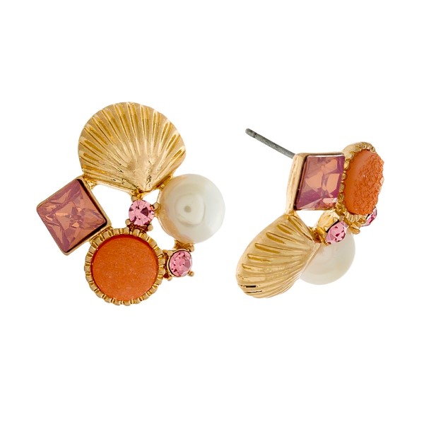 Gold tone stud earrings with a seashell, peach stones, and a pearl bead. Approximately 3/4" in length. 