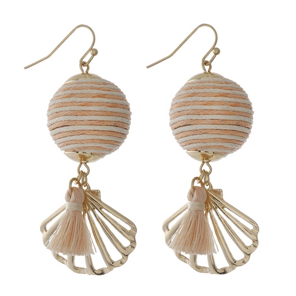 Gold tone fishhook earrings with a peach and ivory thread wrapped ball bead and a seashell charm. Approximately 2" in length. 