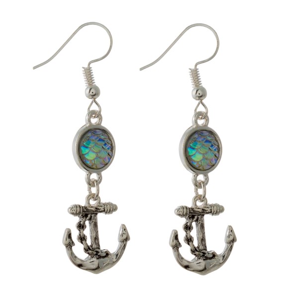 Silver tone, fishhook earring with sea life charm. Approximately 1.5" in length.