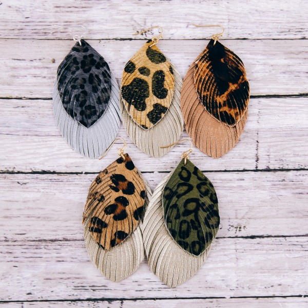 Faux fur leopard print metallic double layered feather earrings. Approximately 3.5" in length.