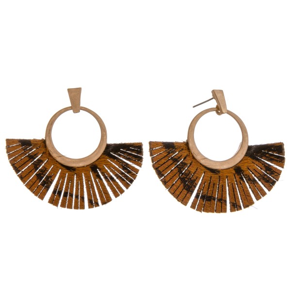 Cowhide leopard print faux leather tassel earrings.

- Approximately 2" in length