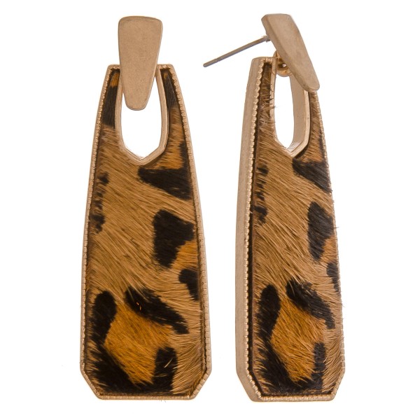 Cowhide encased leopard print oblong earrings.

- Approximately 2" in length