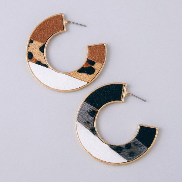 Multi faux leather leopard print encased hoop earrings.

- Approximately 1.75" in diameter