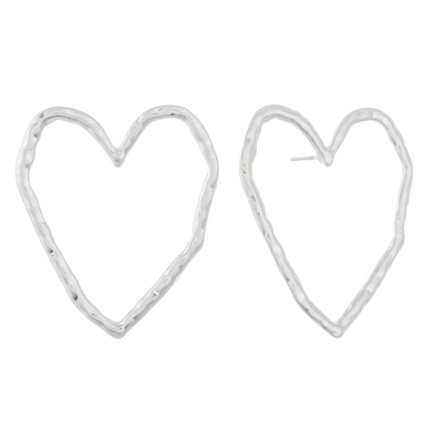 Oversized hammered heart stud earrings.

- Approximately 1.5" L