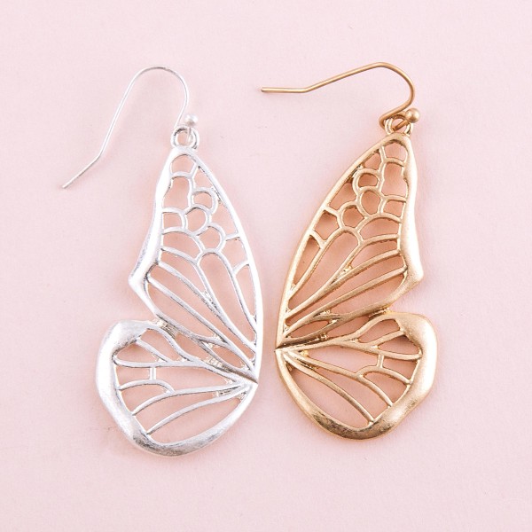 Metal cut out butterfly earrings.

- Approximately 2" L