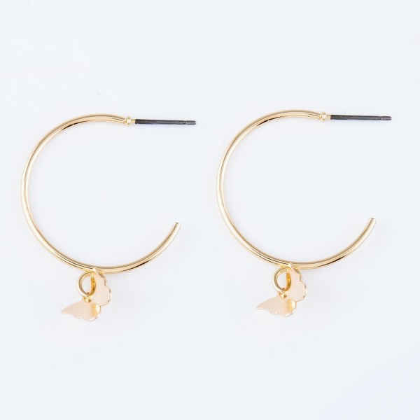 Butterfly dangle hoop earrings.

- Approximately 1.5" L
- 1" in hoop diameter