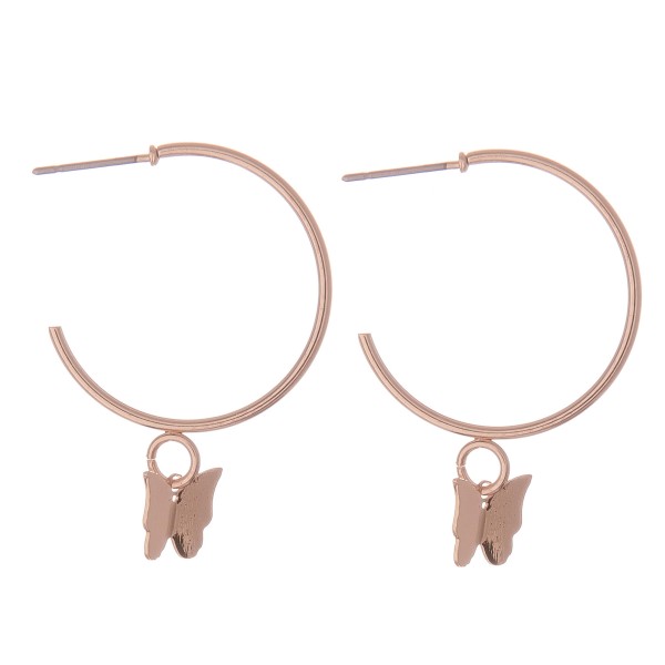 Butterfly dangle hoop earrings.

- Approximately 1.5" L
- 1" in hoop diameter