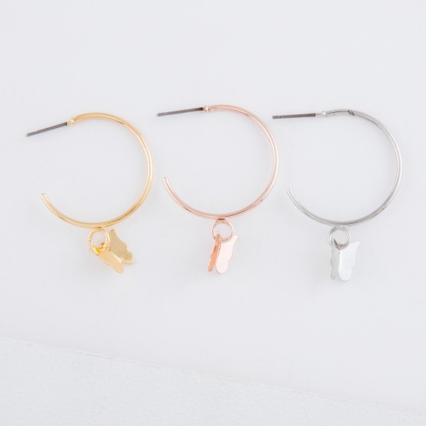 Butterfly dangle hoop earrings.

- Approximately 1.5" L
- 1" in hoop diameter