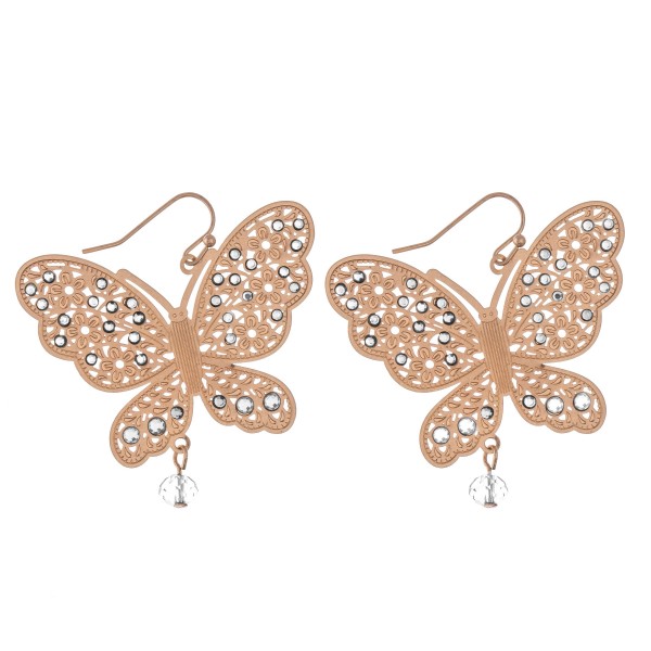 Gold filigree butterfly drop earrings with beaded accents.

- Approximately 2" x 2"