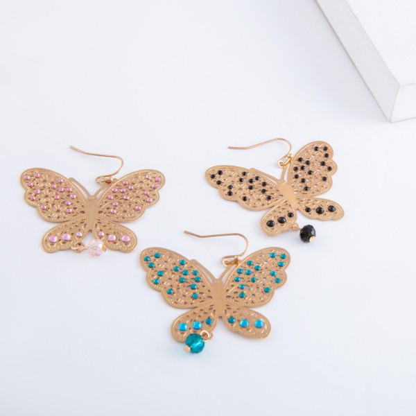 Gold filigree butterfly drop earrings with beaded accents.

- Approximately 2" x 2"