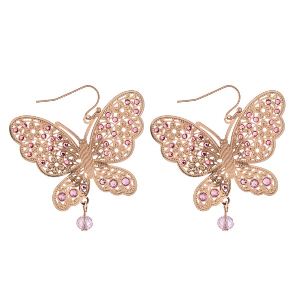 Gold filigree butterfly drop earrings with beaded accents.

- Approximately 2" x 2"