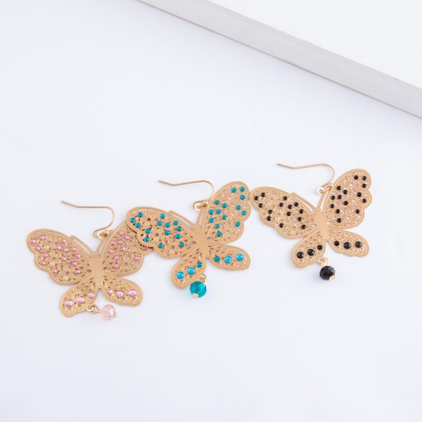 Gold filigree butterfly drop earrings with beaded accents.

- Approximately 2" x 2"