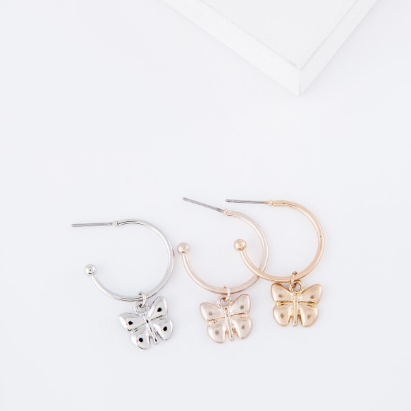 Small Hoop Earrings Featuring A Removable Butterfly Charm 
- Approximately .5" in diameter 