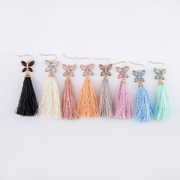 Tassel earrings featuring a jeweled butterfly accent. 
- Approximately 3" L 