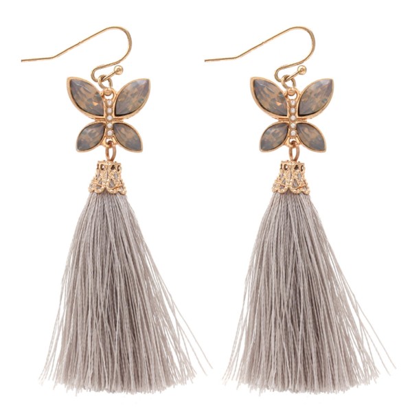 Tassel earrings featuring a jeweled butterfly accent. 
- Approximately 3" L 