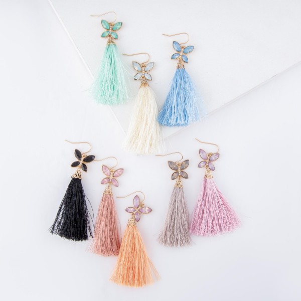 Tassel earrings featuring a jeweled butterfly accent. 
- Approximately 3" L 