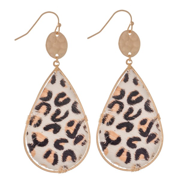 Hammered Leopard Print Cow Hide Teardrop Earrings.

- Approximately 3" L 