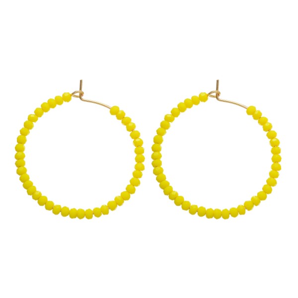 Short Beaded Hoop Earrings.

- Approximately 1.5" in Diameter