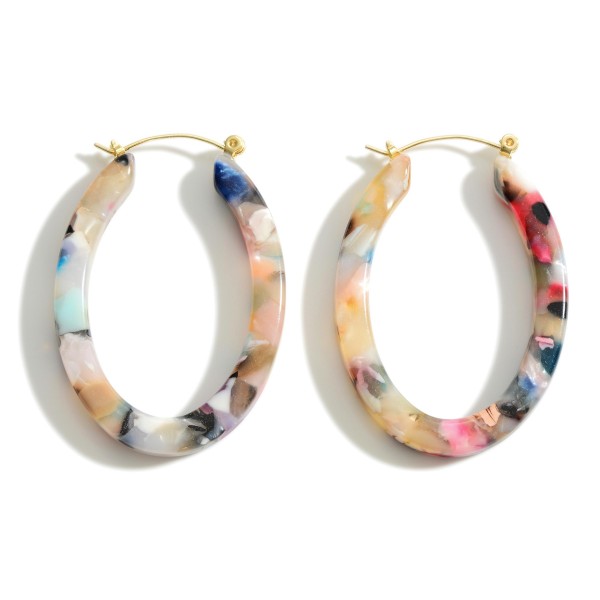 Oval Shaped Resin Hoop Earrings. 

- Approximately 1.5" in Length 