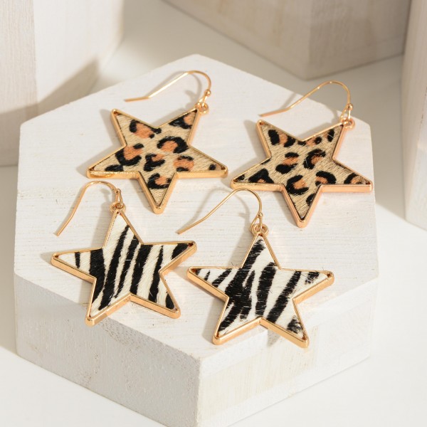 Animal Print Star Earrings. 

- Approximately 1.75" Long