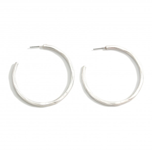 Hammered Metal Hoop Earrings. 

- Approximately 2" Long