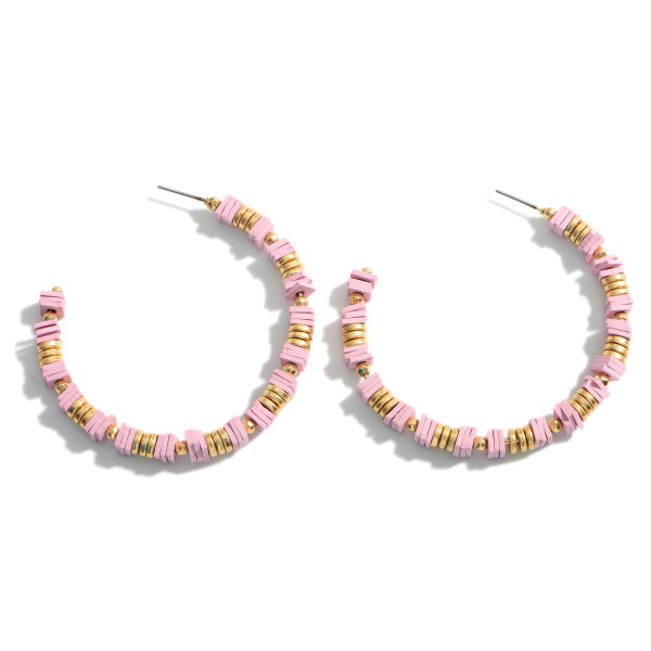 Gold Hoop Earrings Featuring Heishi Bead Accents.

- Approximately 2.25" in Diameter