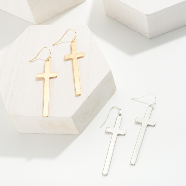 Metal Tone Cross Earrings
- Approximately 2" Length