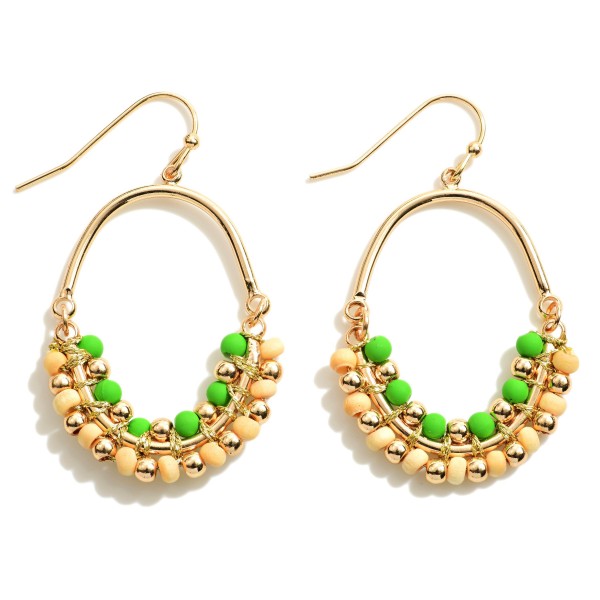 Gold Tone Wood Beaded Drop Earrings

- Approximately 1.75" L