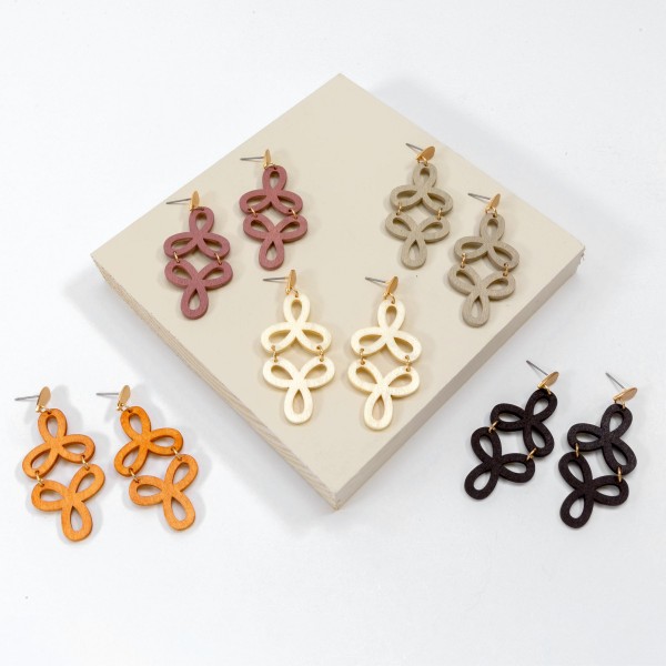 Gold Tone Wooden Arabesque Drop Earrings

- Approximately 2.25" L