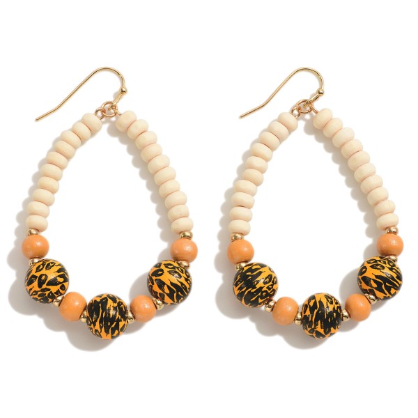 Wood Beaded Teardrop Earrings Featuring Animal Print Beads 

- Approximately 2" L 