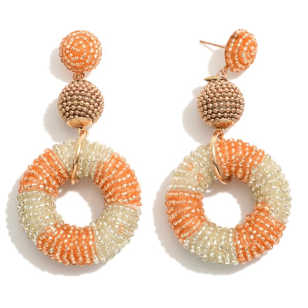 Beaded Circular Drop Earrings Featuring Gold Tone Accents 

- Approximately 3" L