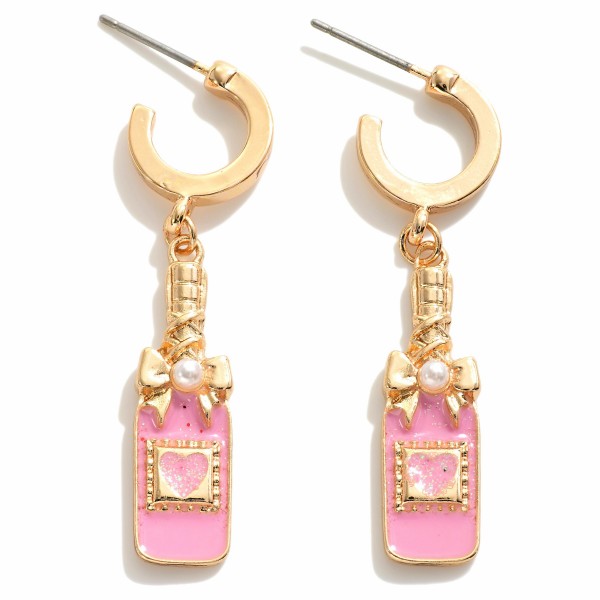 Huggie Hoop Earrings Featuring Enamel Heart Champagne Bottle Charms

- Approximately 1.75" L