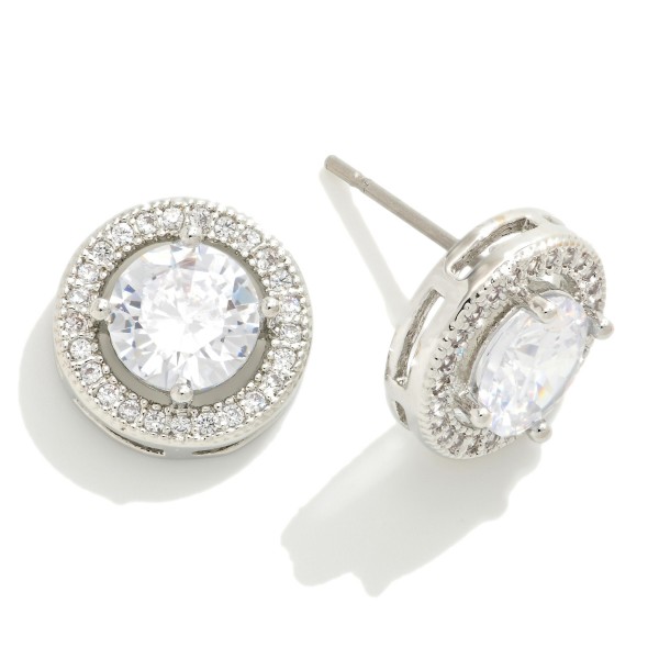 Circular Stud Earrings Featuring Round Stone With Pave Accent

- Approximately 0.5" Diameter 
- Premium Cubic Zirconia 

* Gold Pair is 14K Gold Plated 