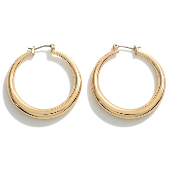 Brass Hollow Hoop With Taper Detail 

- Approximately 1.25" L
- Premium Genuine Brass Hollow Hoop
- Hypoallergenic 
